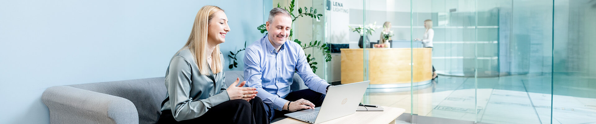Lena Lighting- checking on the computer